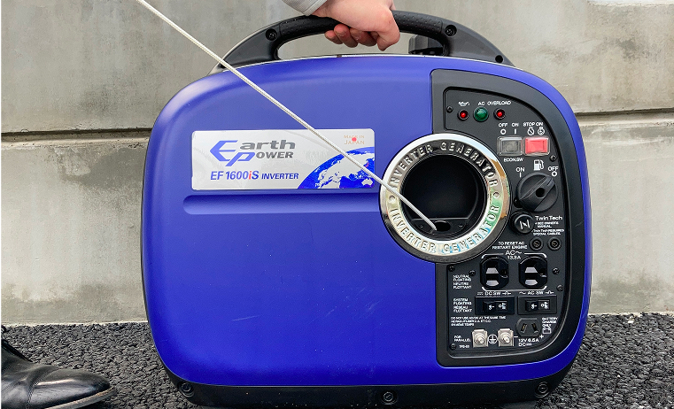 Photo of gently pulling the recoil starter handle