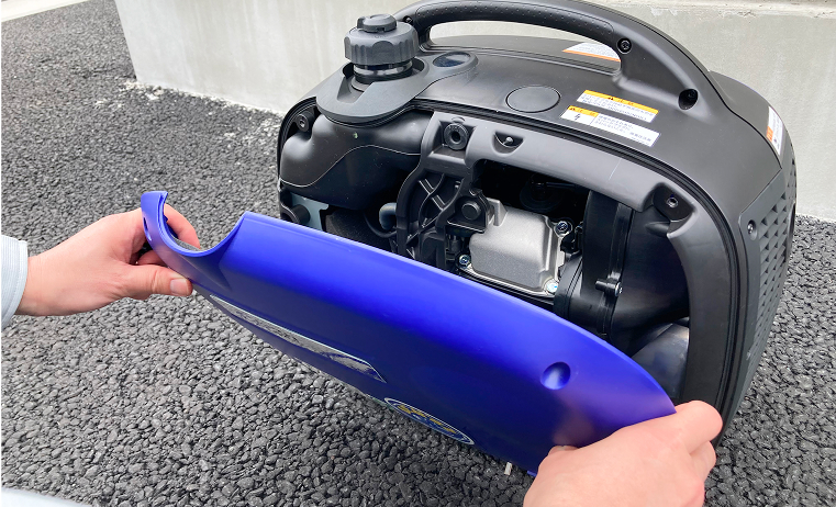 Photo of pulling the back cover outward to remove it